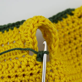 Umrandung an den Ärmel häkeln