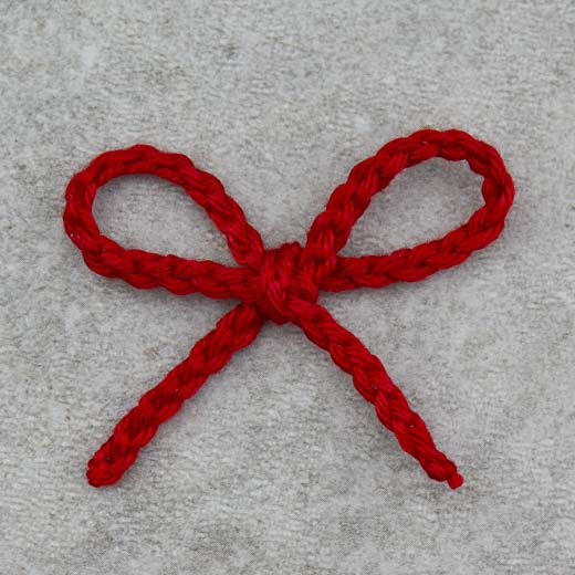 Schleife aus Luftmaschenkette - Anleitung